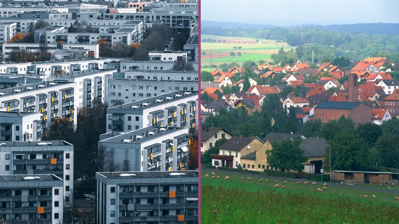 Großsiedlung mit Mehrfamilienhäusern links, dörfliche Einfamilienhäuser im ländlichen Raum rechts.